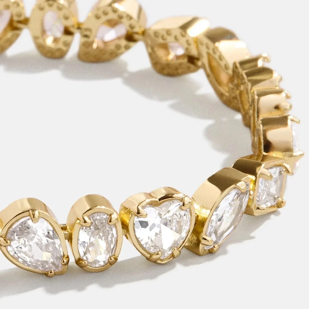 Exquisite tennis style bracelet with asymmetrical cut Swarovski crystals BNIB